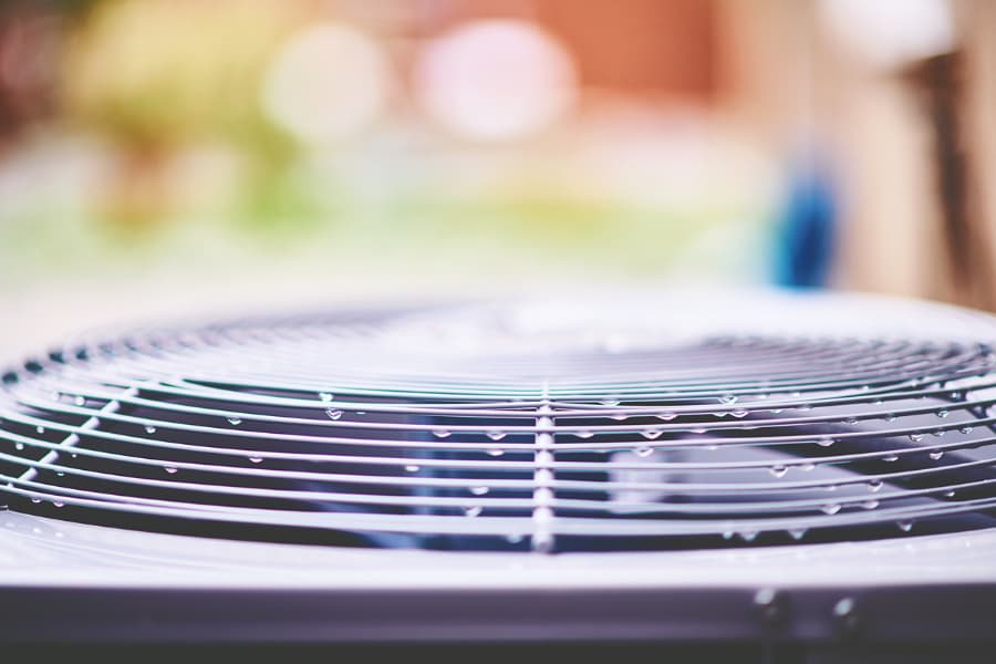 Air conditioner unit with raindrops